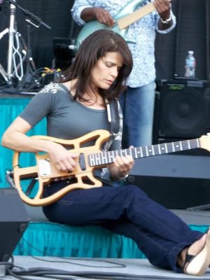 Joyce Cooling Playing Travel Guitar #1.jpg Joyce Cooling Playing Travel Guitar #1.jpg