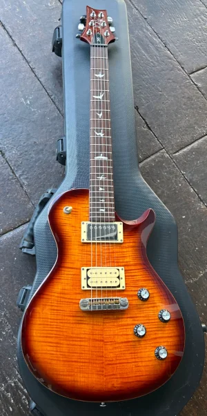 PRS_SE_245_Standard_Tobacco_Sunburst_w_Hardshell_Case-696abed29d8c8_d605fd74-6ef1-4089-9d67-d...webp